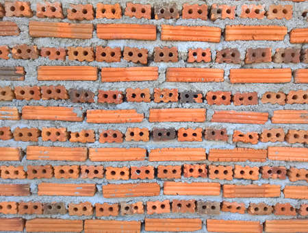 Brick block wall under construction for background.の写真素材