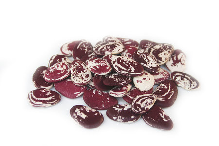 Raw white and red beans on white background