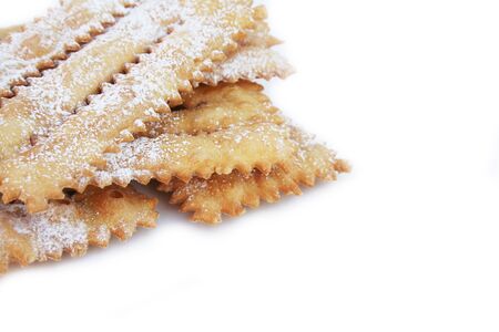 Italian carnival pastry on white. Traditional carnival pastry, chatter or crostoli, lies, rags.の写真素材