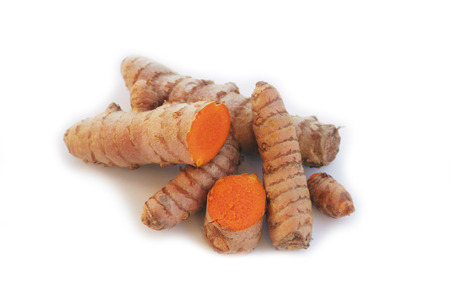 Close-up of Turmeric rhizome isolated on white background. Curcuma longa with selective focusの写真素材