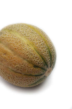 Fresh whole ripe melon isolated on white background. Cucumis meloの写真素材