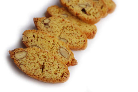 Traditional Italian Cantucci or Cantuccini cookies with almonds isolated on white backgroundの写真素材