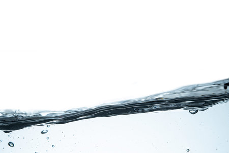 Water splash isolated. Close up of splash of water forming flower shape, isolated on white...