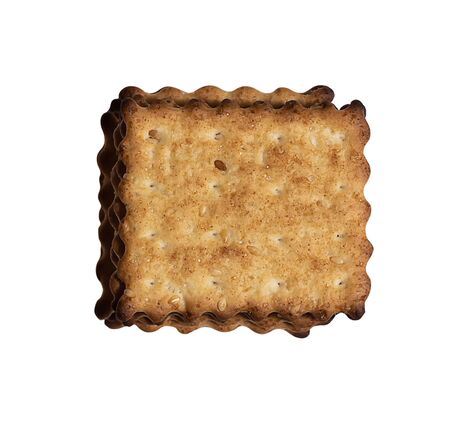 Macro photo of brown dietary low-calorie crispy cereal cracker with sesame dressing close-up on a white backgroundの写真素材