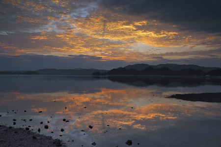 Sea of Nago, Okinawa Prefecture sunriseの写真素材