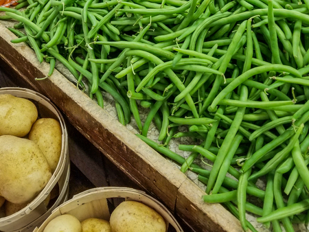 Green beans and potatoes at a farmers marketの写真素材
