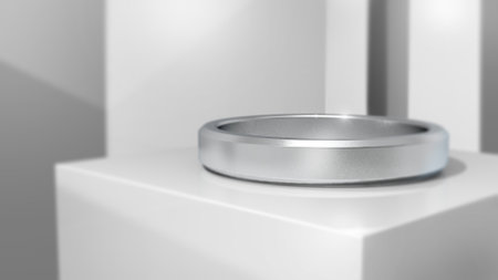 3d render of white podium with silver ring for product display.の写真素材
