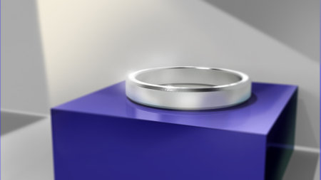 Wedding rings on a blue pedestal. 3D renderingの写真素材