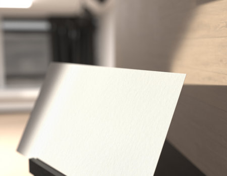 Blank paper sheet on table in kitchen, mockup for designの写真素材