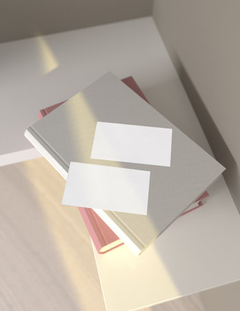 Blank business card on bookshelf. 3D rendering.の写真素材