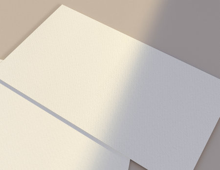 Featuring a simple and harmonious background, this premium business card mock-up file is perfect for showcasing your branding and logo.の写真素材