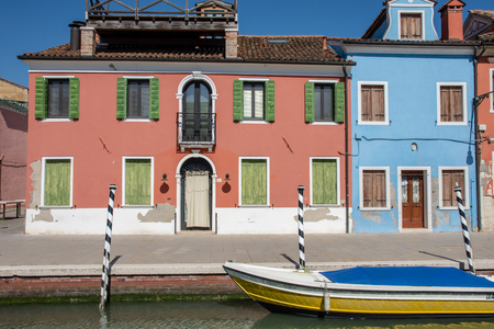 colorful boat and buildings Burano Italy canalの写真素材