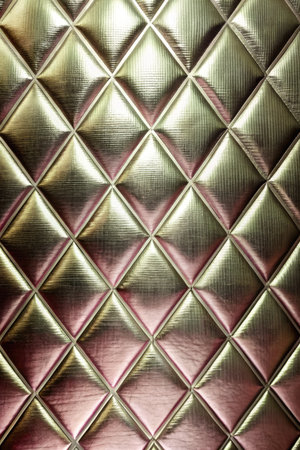 Close up of a metal background with a pattern of rhombusesの素材