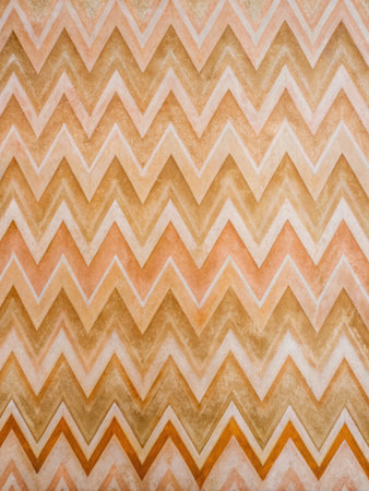 Vintage zigzag pattern on grunge paper texture background.の素材