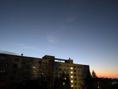 Silhouette of a residential building in the evening at sunset.の写真素材