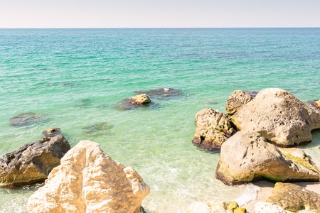 View of the Caspian Sea and rocks, stones, Aktau, Kazakhstan. Sunny day.の写真素材