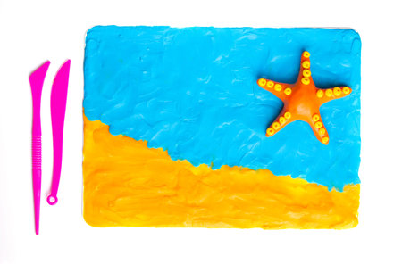 Plasticine modeling starfish. Sea background. Travel Top viewの写真素材