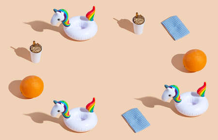 Background. Marine pattern. Summer concept, joy. Orange, drink, inflatable toy, sunbedの写真素材