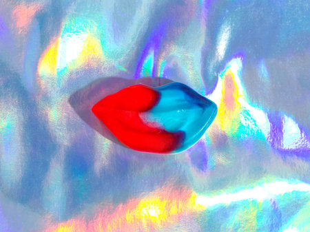 Gummy neon lips are red with blue. halloween