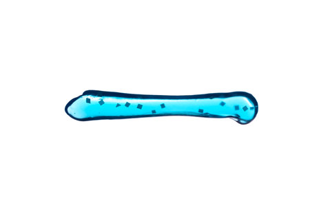 Blue toothpaste strip with crystals inside. Style trendの写真素材