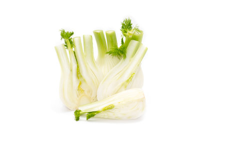 Half and part and whole fennel bulb located on white background. Creative photo. Healthy food.Mediterranean food.の写真素材