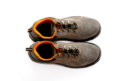 Pair of comfortable Brown working boots isolated on white, top viewの写真素材