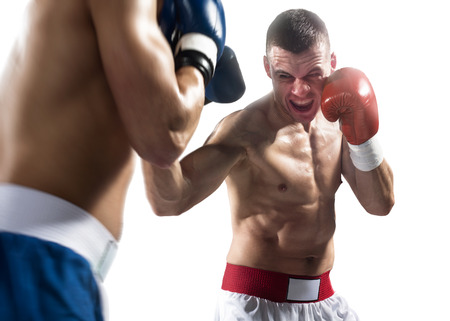 Two isolated professionl boxers are fighting on the white backgroundの写真素材