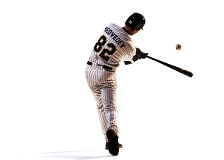 isolated on white professional baseball player in action