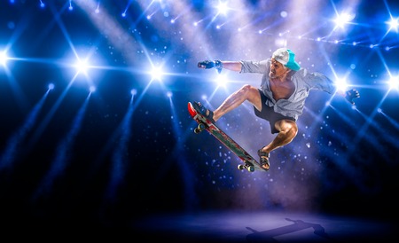 The old man is skating on the grand arenaの写真素材