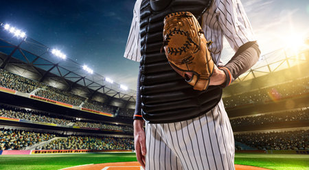Professional baseball player in action on grand arenaの写真素材