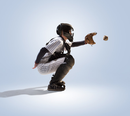 isolated on white professional baseball player in actionの写真素材