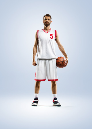 Basketball player in action isolated on whiteの写真素材