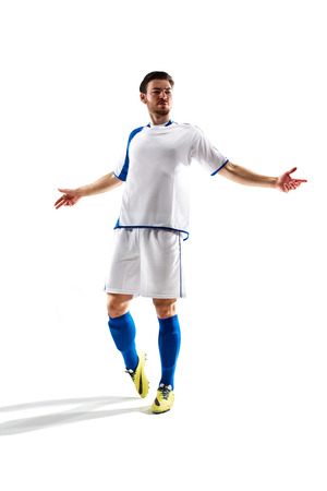 football soccer player in action  isolated on color backgroundの写真素材