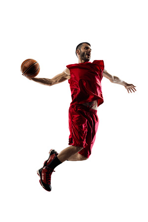 Basketball player in action isolated on white backgroundの写真素材