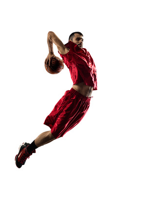 Basketball player in action isolated on white backgroundの写真素材