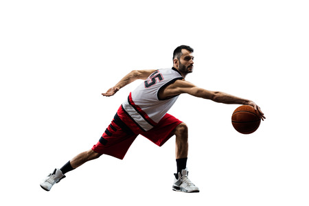 Basketball player in action isolated on white backgroundの写真素材