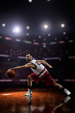 Basketball player in actionの写真素材