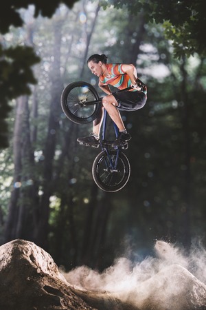 bmx bicycle rider tricking on the highlights bmx bicycle rider tricking on the highlights