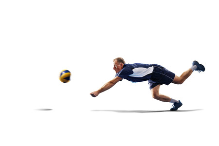 Professional valleyball player in action isolated on whiteの写真素材