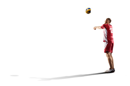 Professional valleyball player in action isolated on whiteの写真素材