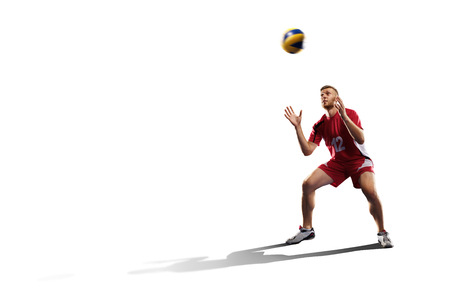Professional valleyball player in action isolated on whiteの写真素材