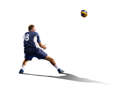 Professional valleyball player in action isolated on whiteの写真素材