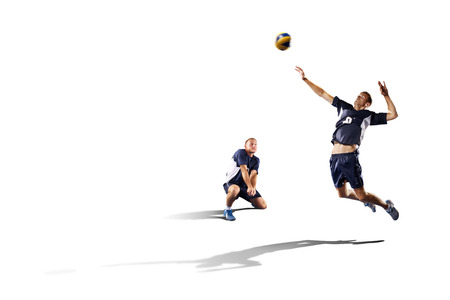 Two professional volleyball players in action isolated on whiteの写真素材