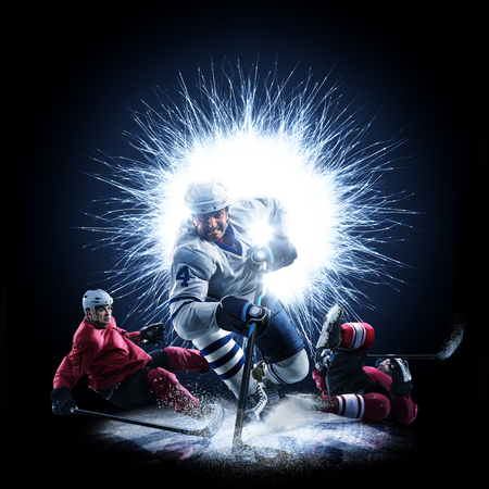 Ice Hockey players are skating on a abstract backgroundの写真素材