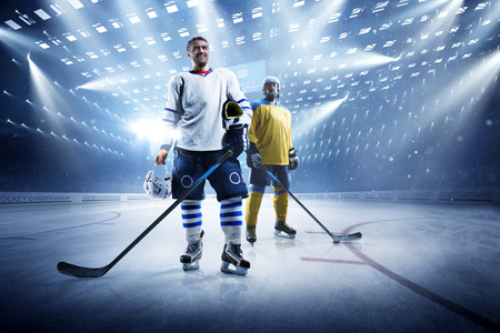 Ice hockey players on the grand ice arenaの写真素材