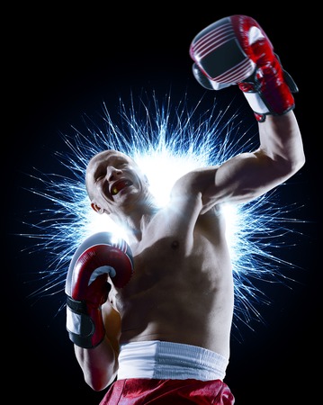 professional boxer isolated in black background darkの写真素材