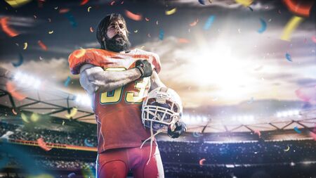 American football sportsman player on stadium in actionの写真素材