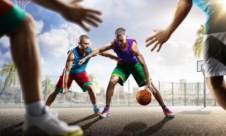 day light professional basketball players in the actionの写真素材