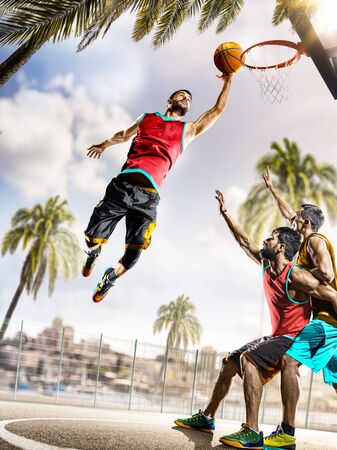 day light professional basketball players in the actionの写真素材