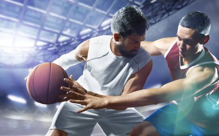 day light professional basketball players in the actionの写真素材